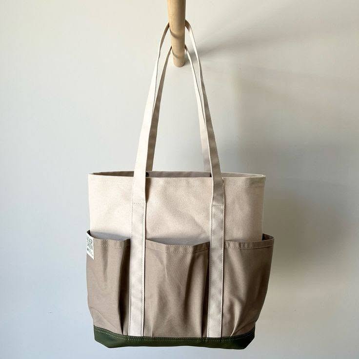 Cream and neutral canvas tote bag with olive base